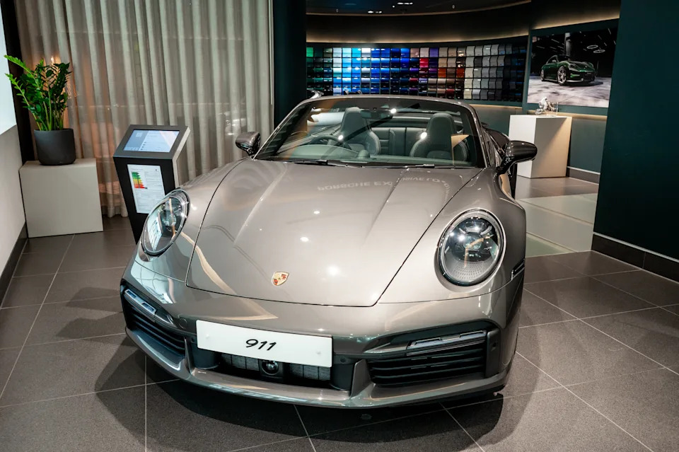 Porsche stock slides on profit forecast; company may 'pass' tariff costs on to customers